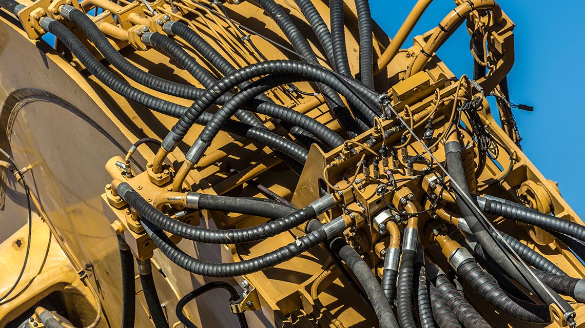 Many Valves attached to cat machine