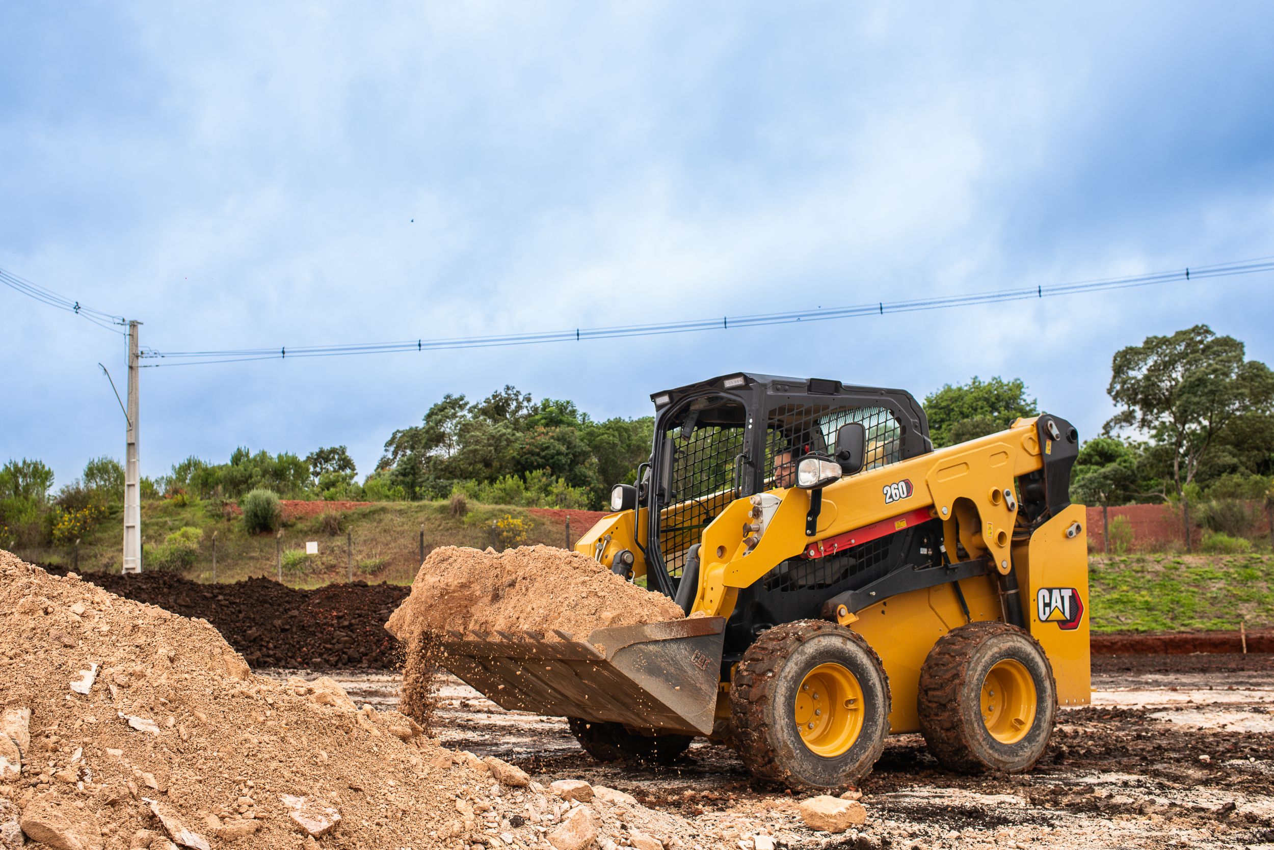 Cat® 260 slirstyrd lastare