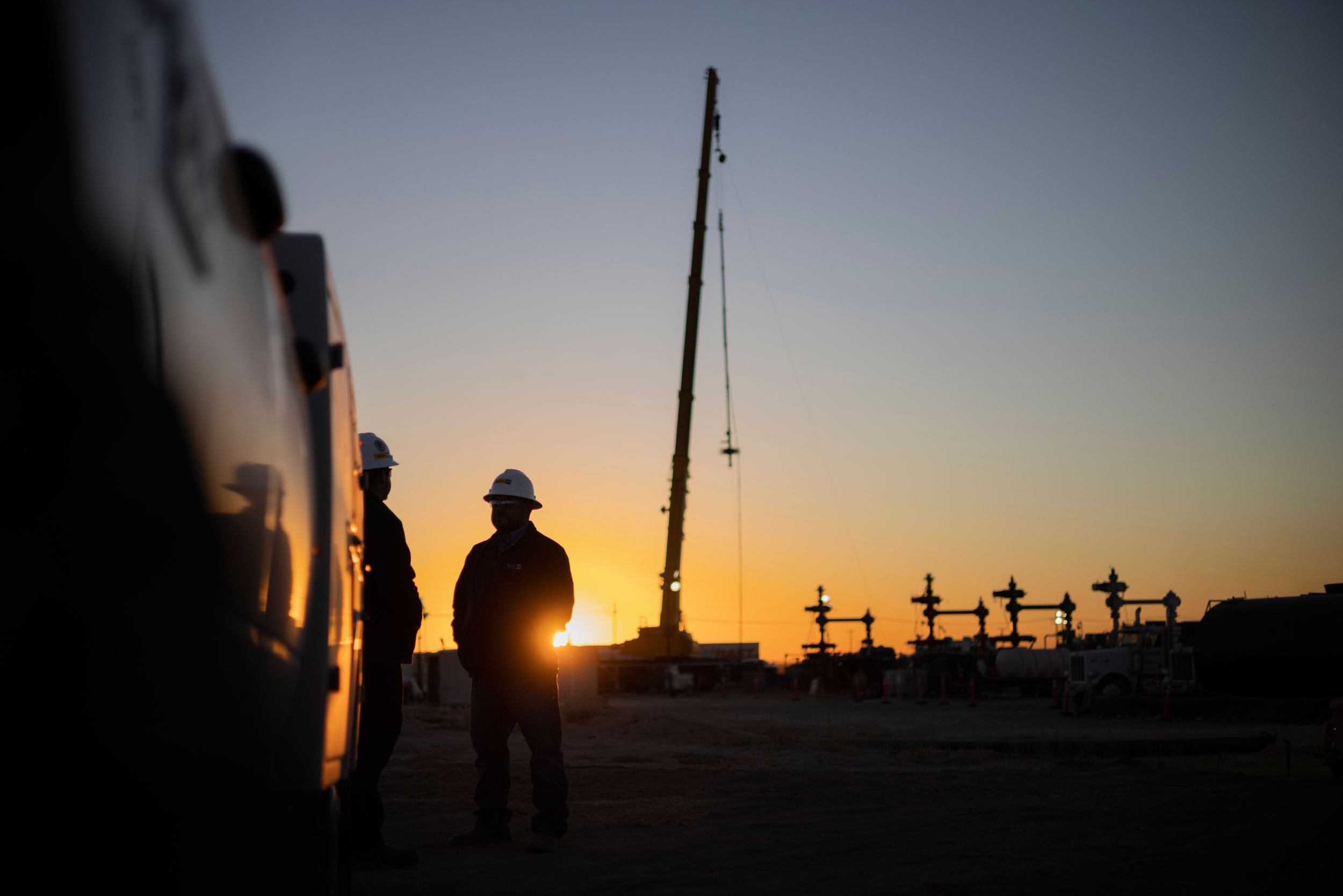 Service men on well service site