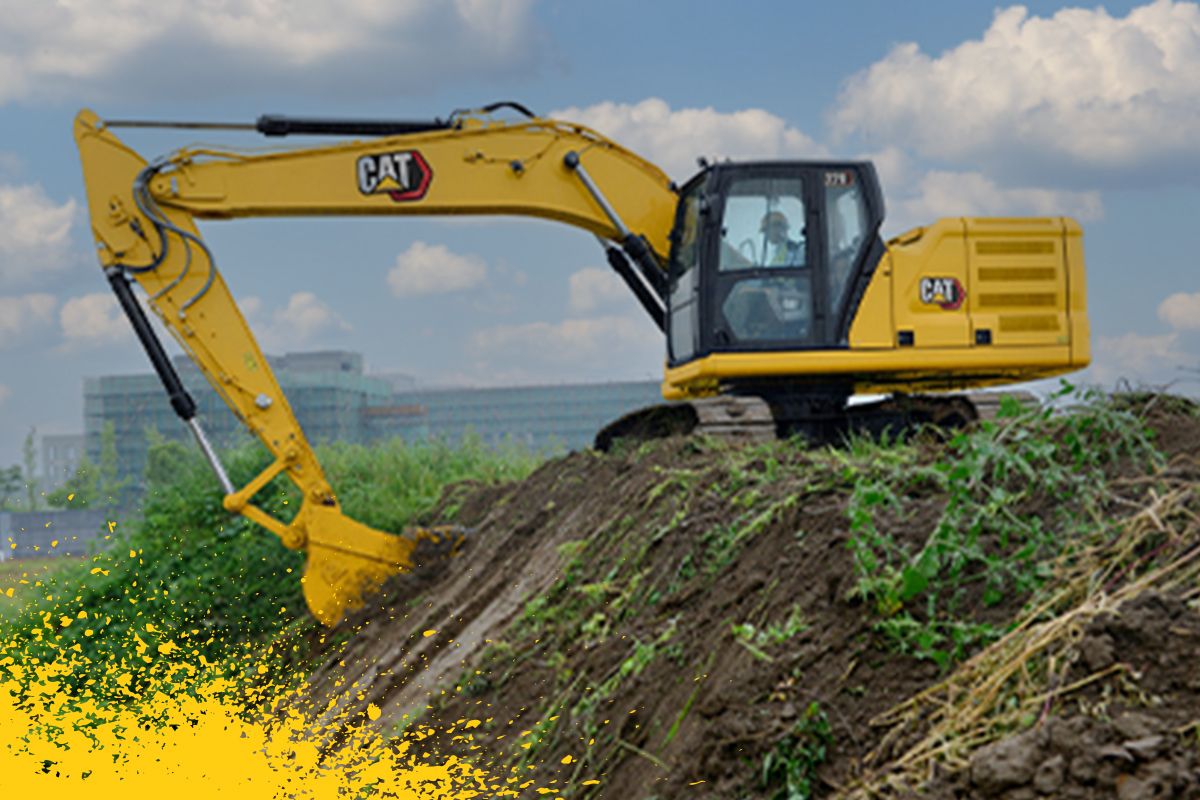 escavadeira média escavando sujeira na colina