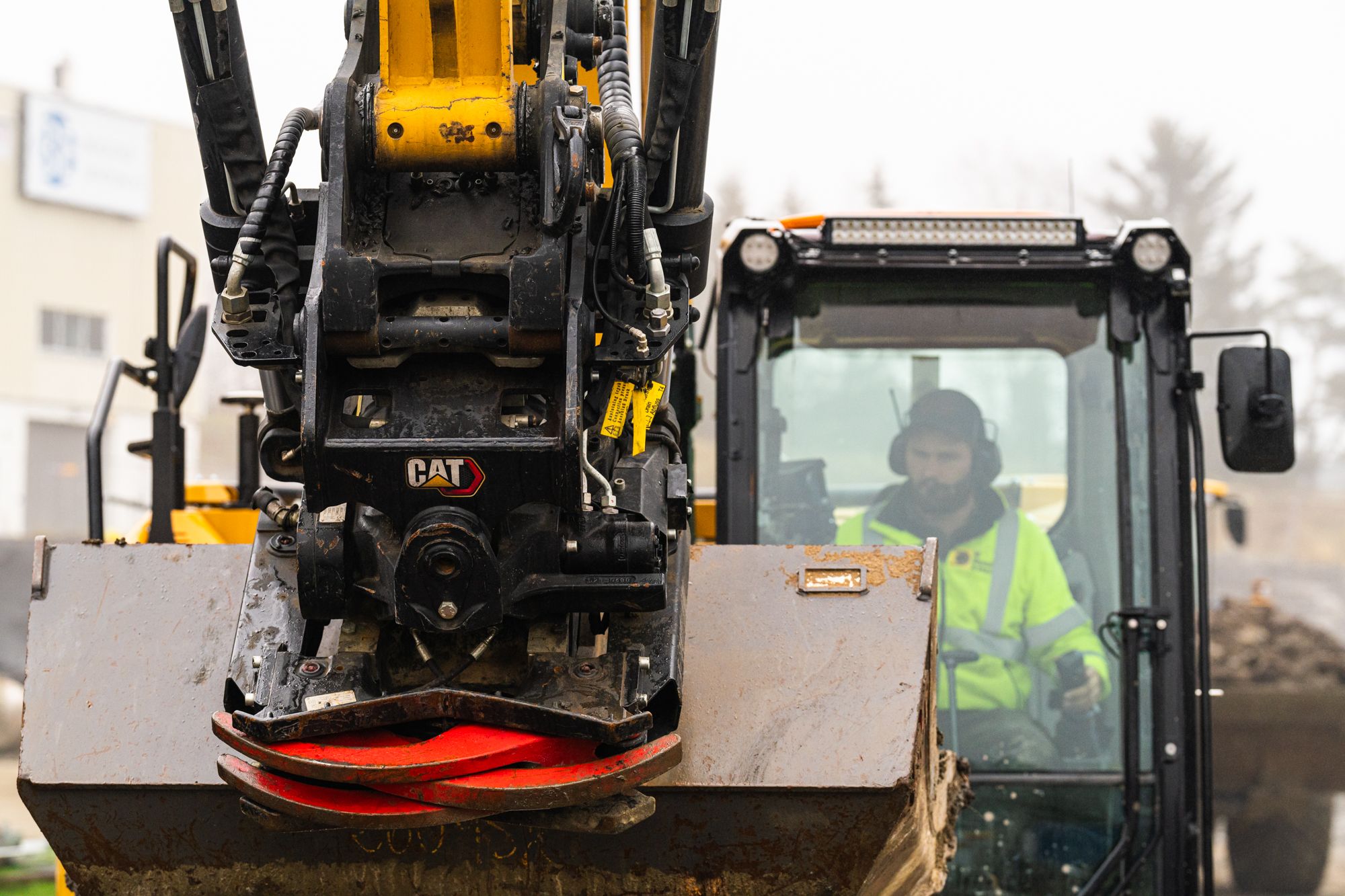 315 excavator working with a tiltrotator.