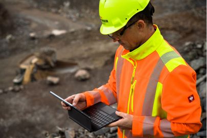 Man looking at a tablet