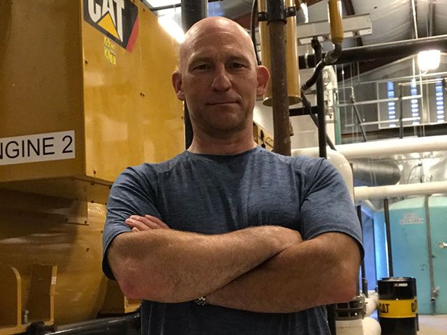 Senior male Cat machine owner/operator