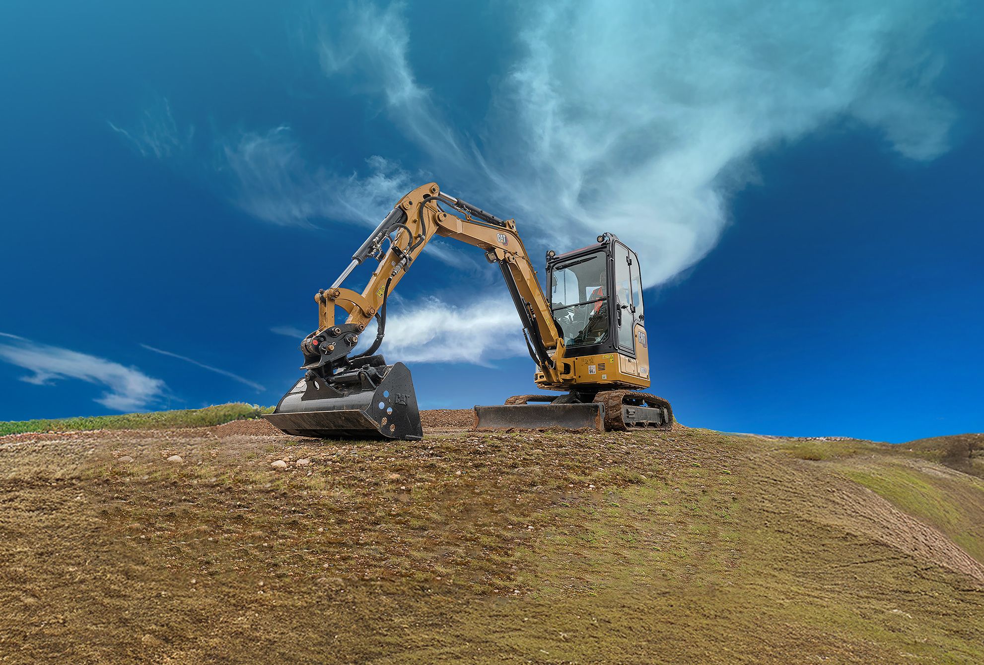 Cat®️ Next Generation Mini Excavators bring big machine features standard across all models
