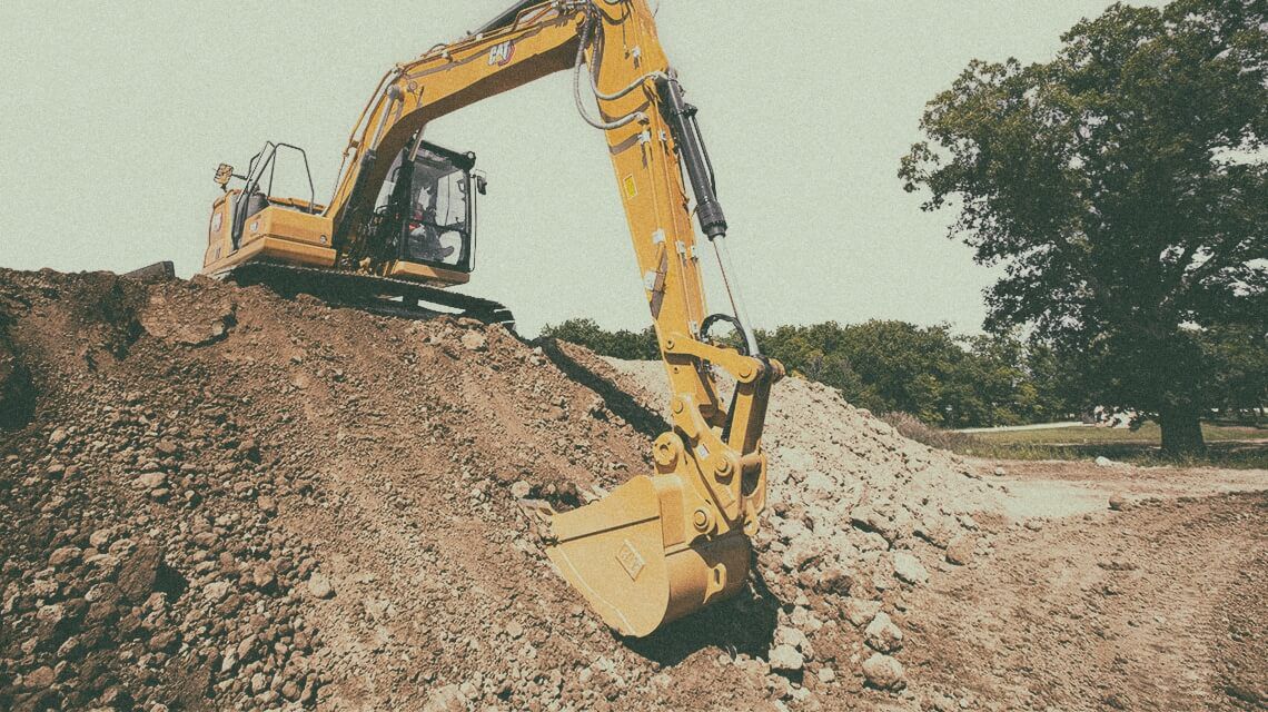 Cat excavator | Grade