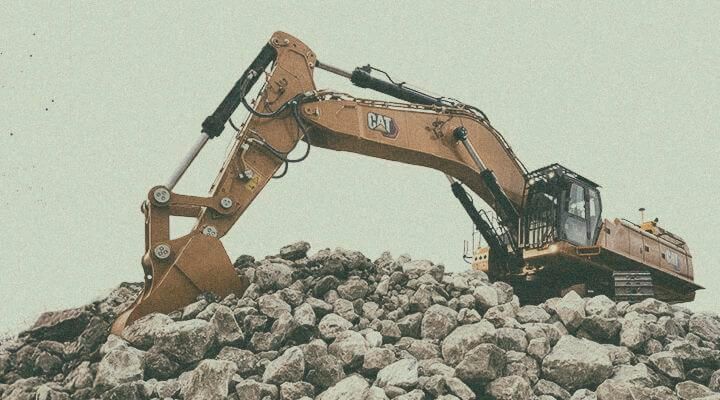 Excavator picking up dirt