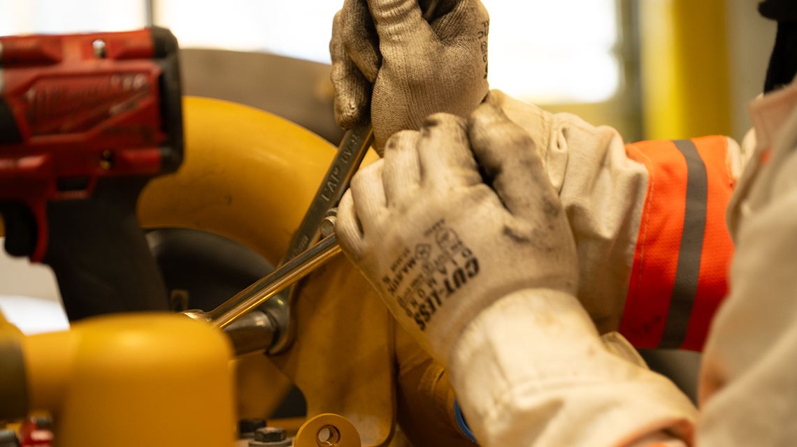 At N C Machinery, a Cat dealer technician works on a rebuild.