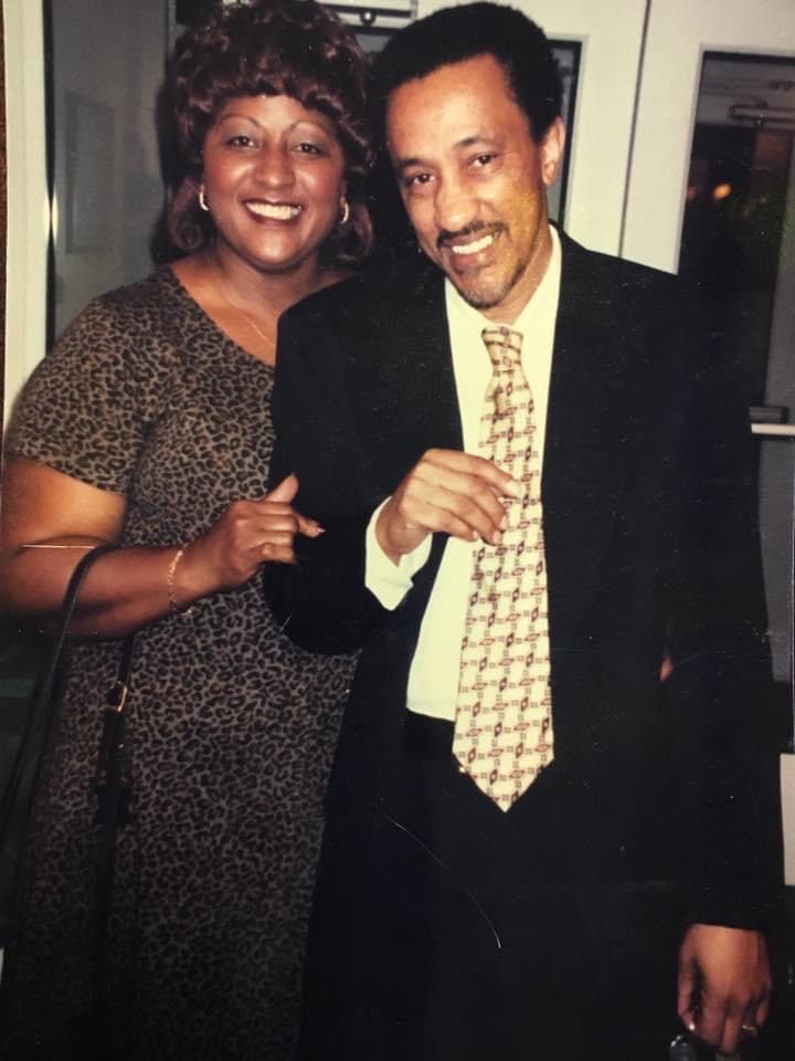 Man and woman posing for a photo