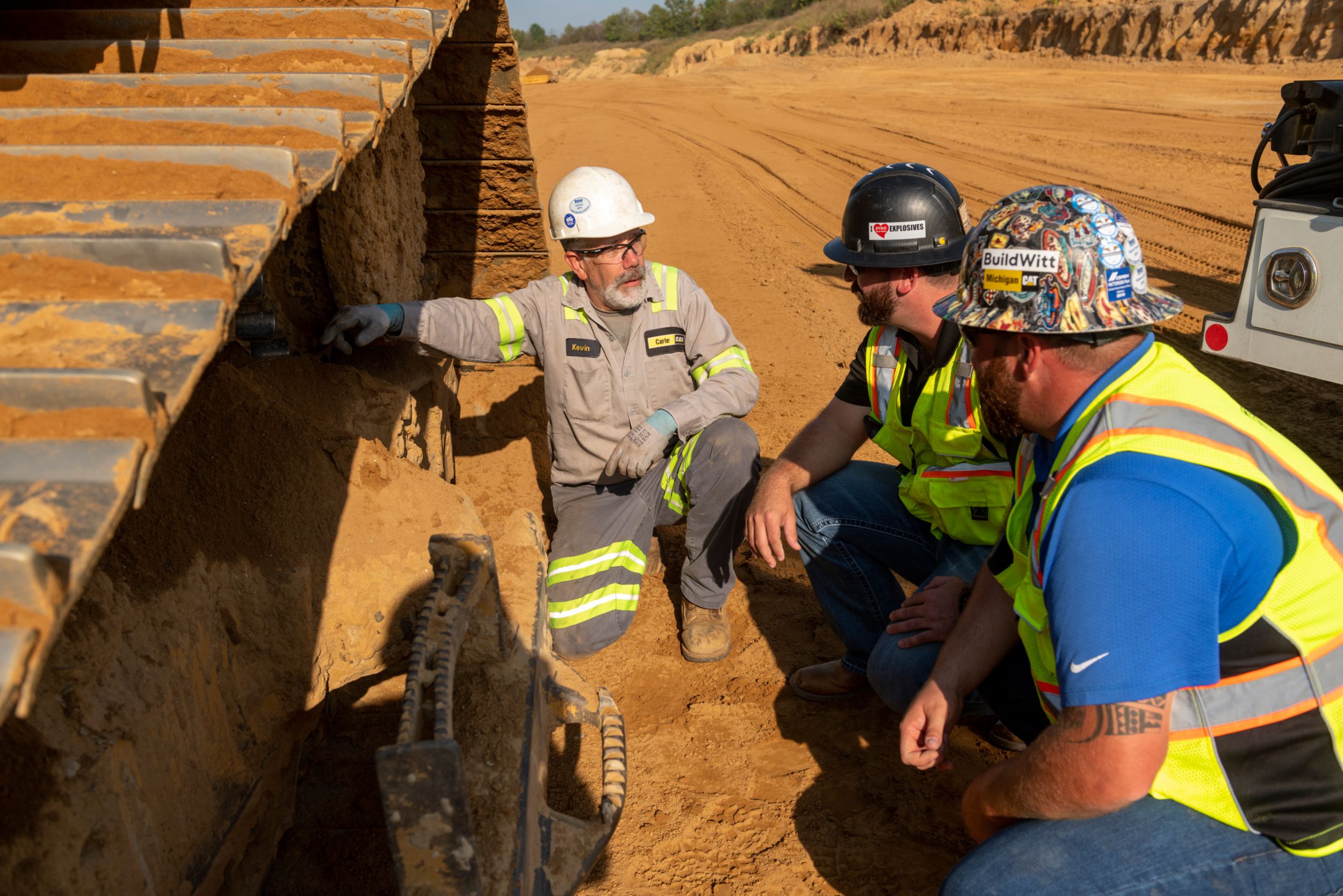 three techs working on a machine