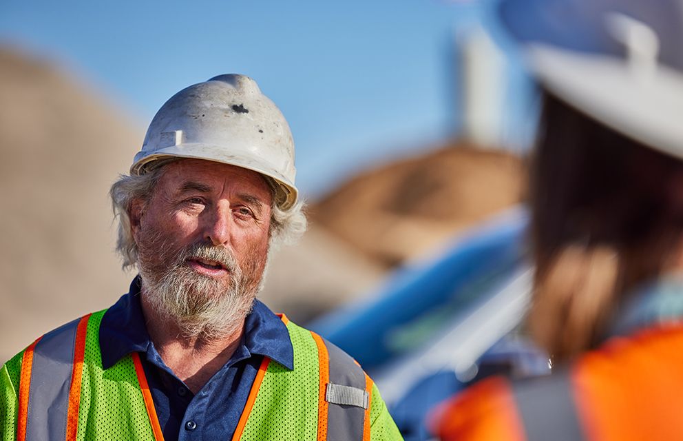 Person in hardhat and vest