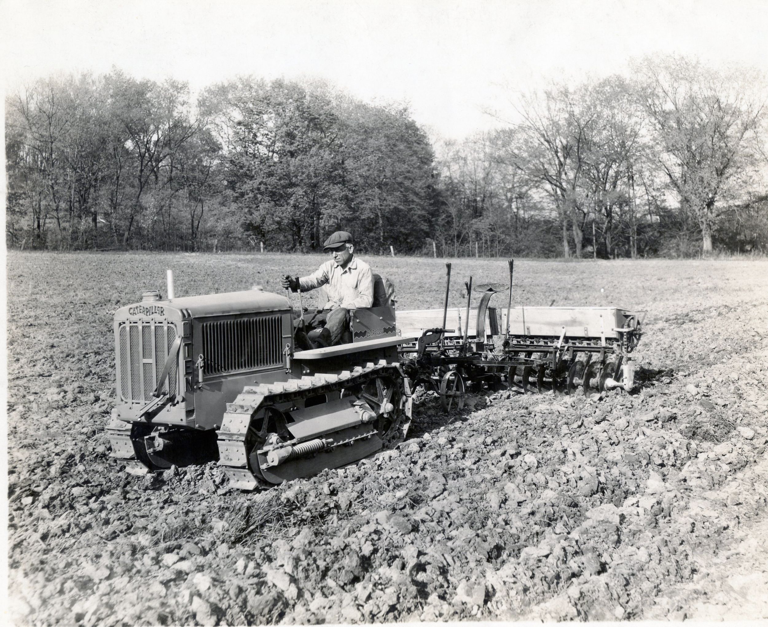 Caterpillar Ten Track-Type Tractor working in a field, ca. 1930.