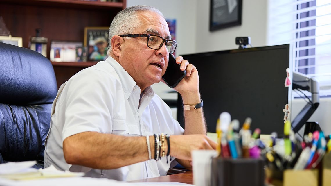 worker on the phone at a desk