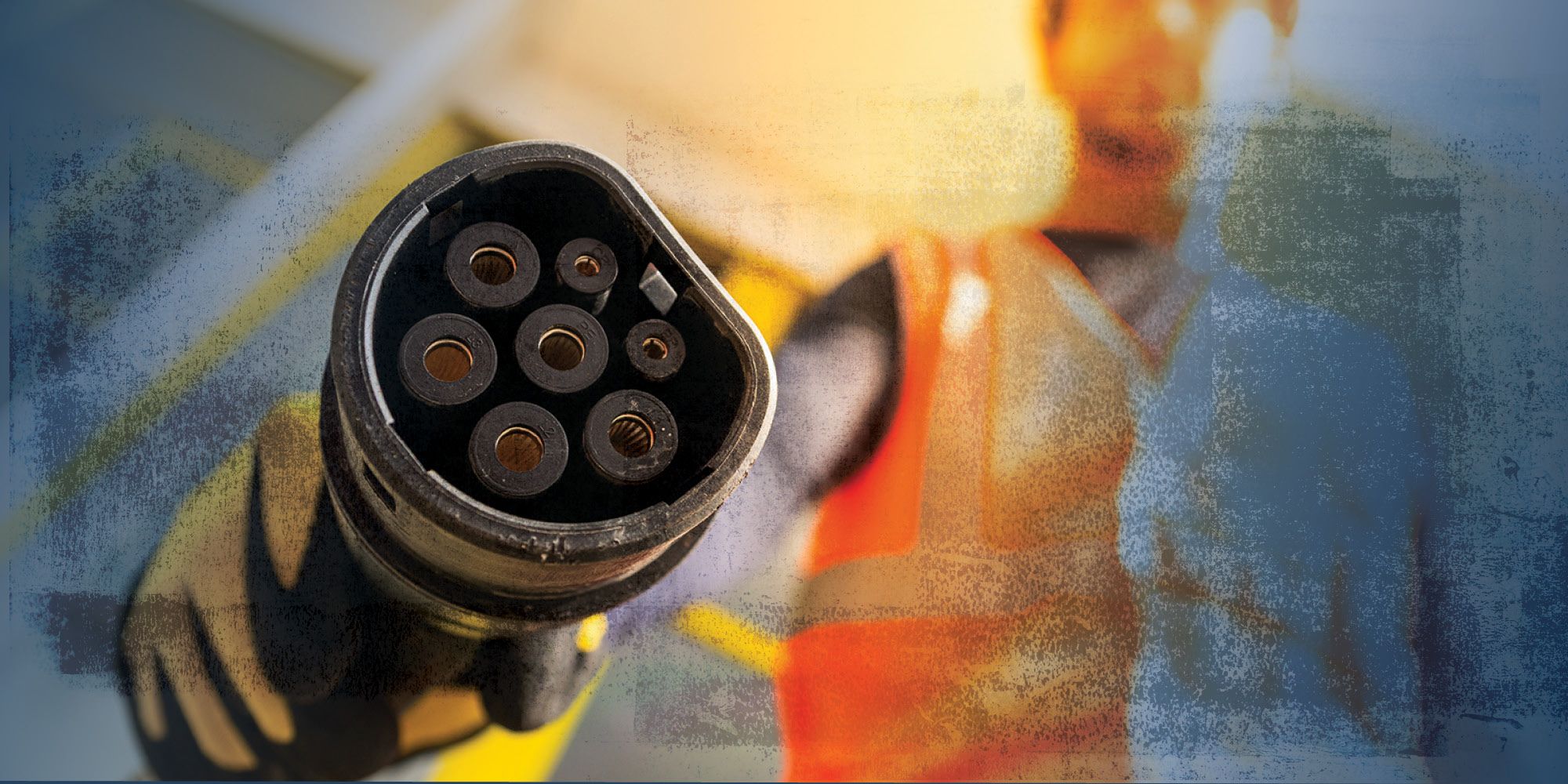 Man holding charging cable