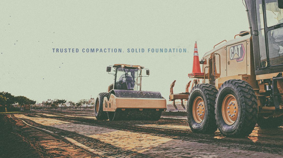 a soil compactor at work with "TRUSTED COMPACTION. SOLID FOUNDATION." embedded into the image