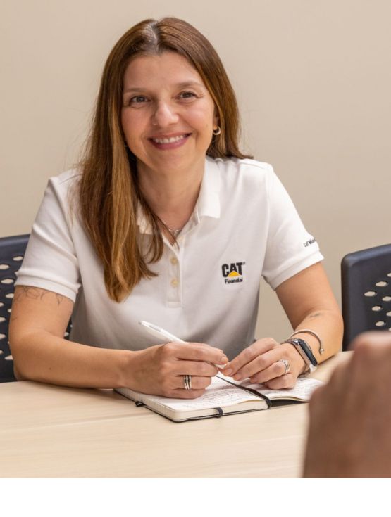 Cat Financial rep helping customer 