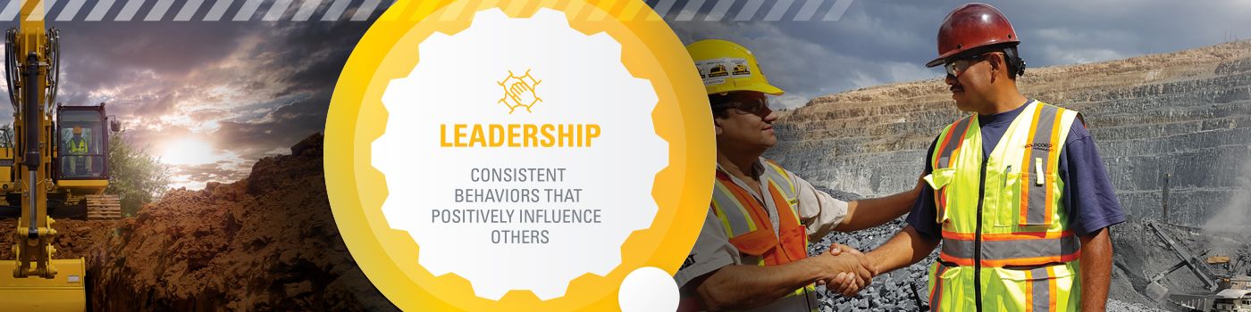 Three people talking near service truck