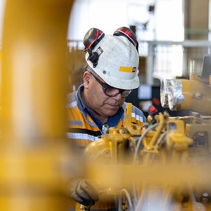 Man focusing on machine