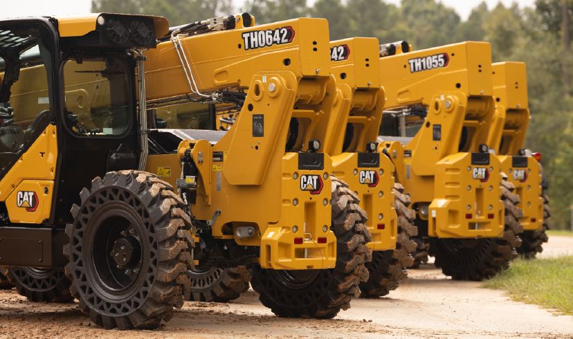 Row of 4 parked telehanders