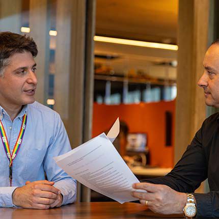 Cat Financial employee talking with customer