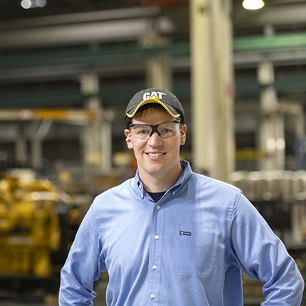 Cat employee smiling at camera