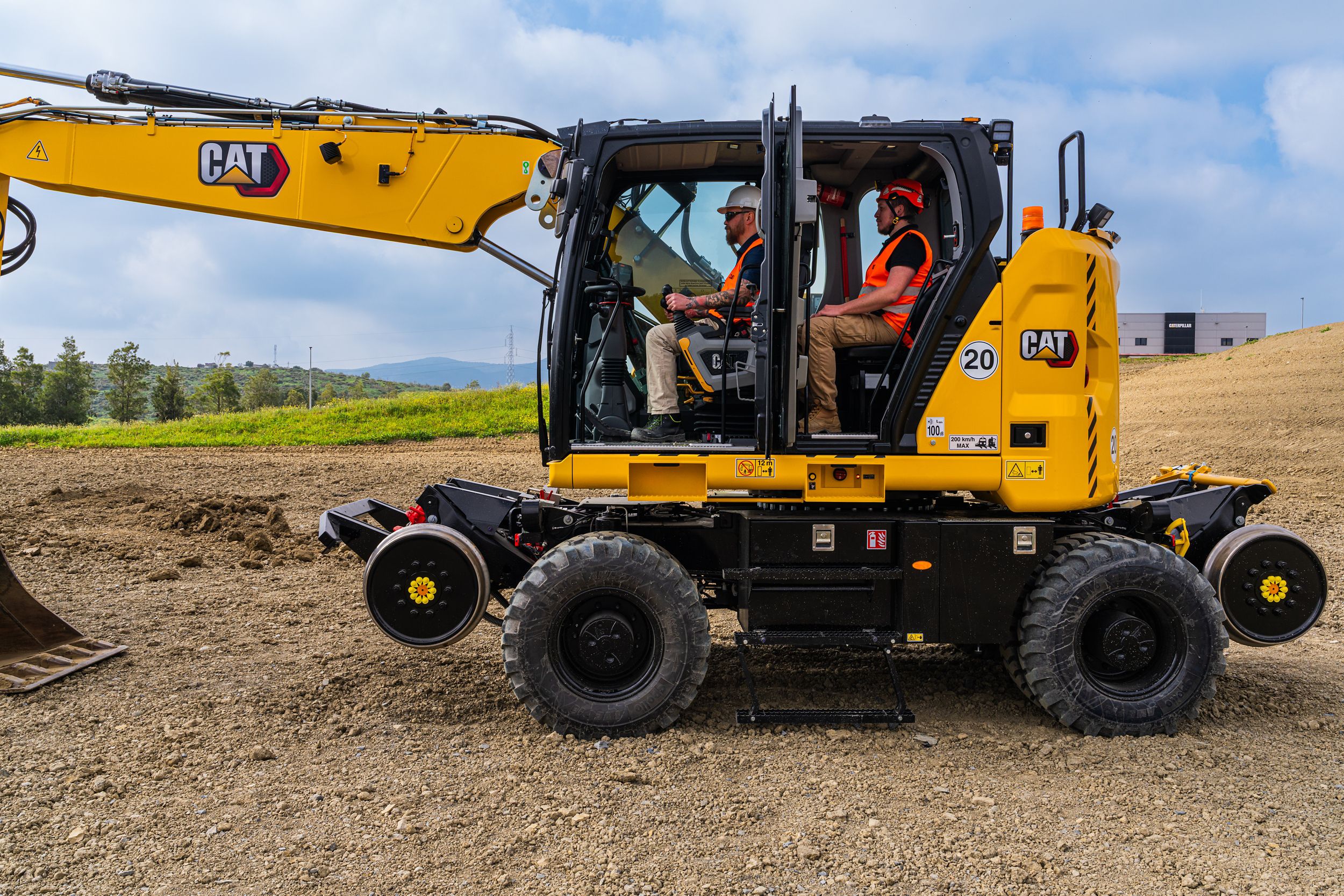 M323 Railroad Excavator operators in the cab