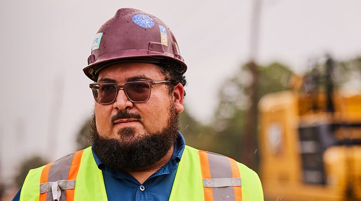 worker wearing a hard hat and glasses