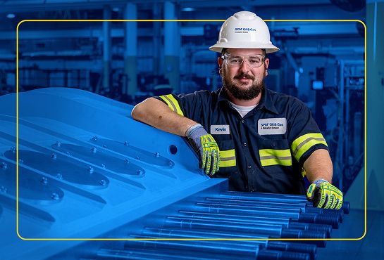 Man posing with a well service pump