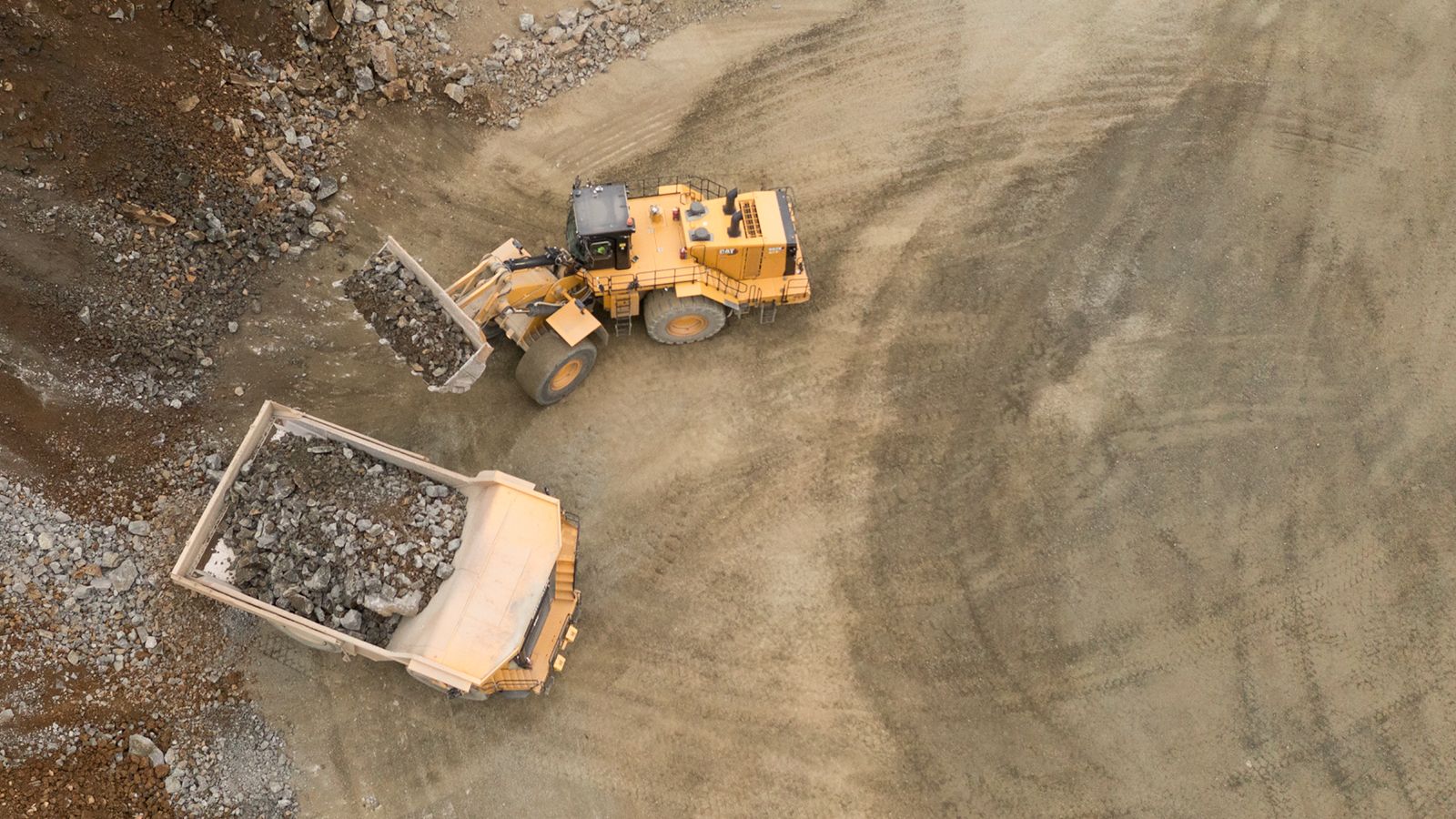 Wheel loader loading truck