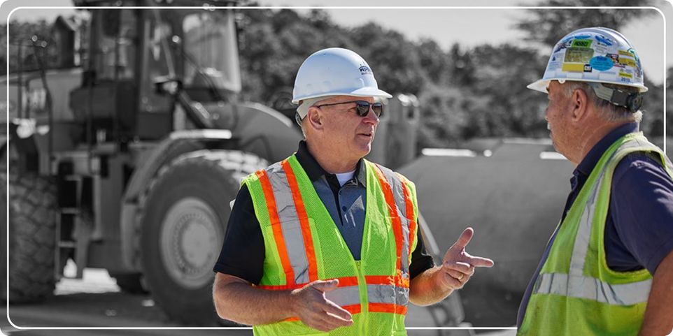 Cat dealer talking to customer 