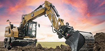 313 Cat Excavator moving dirt on jobsite
