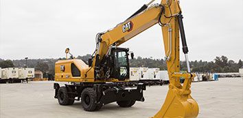 313 Cat Excavator moving dirt on jobsite