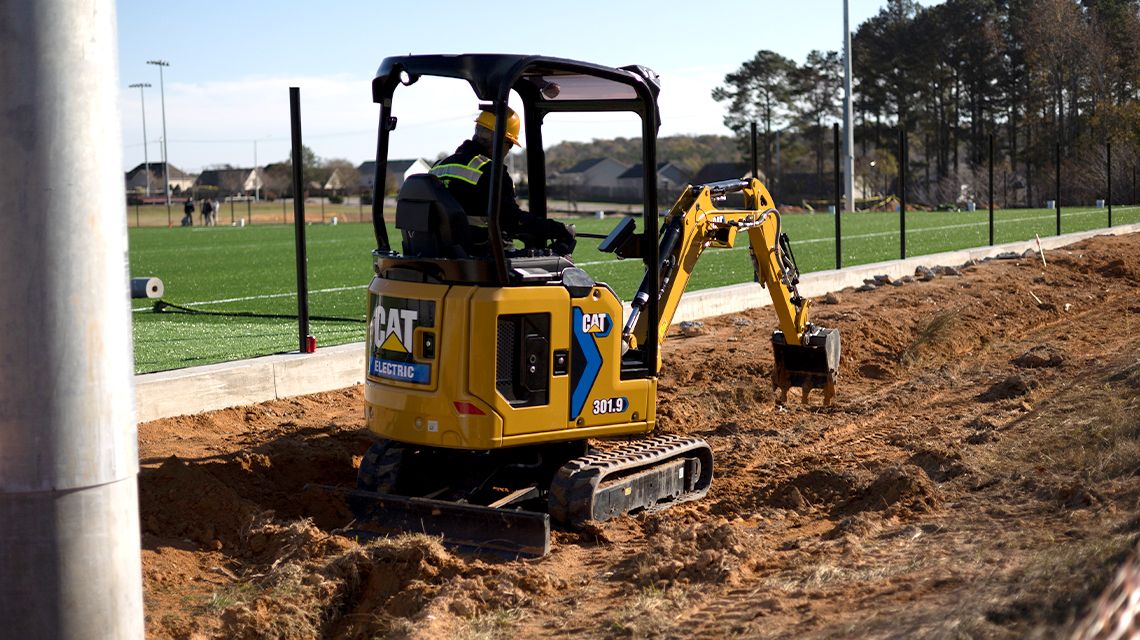 a 301.9 electric mini excavator at work