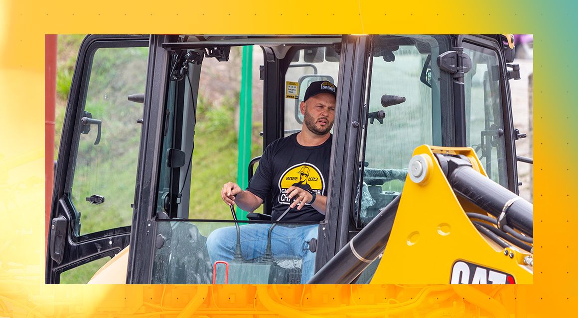 Gilberto Scheidt operating a Cat machine