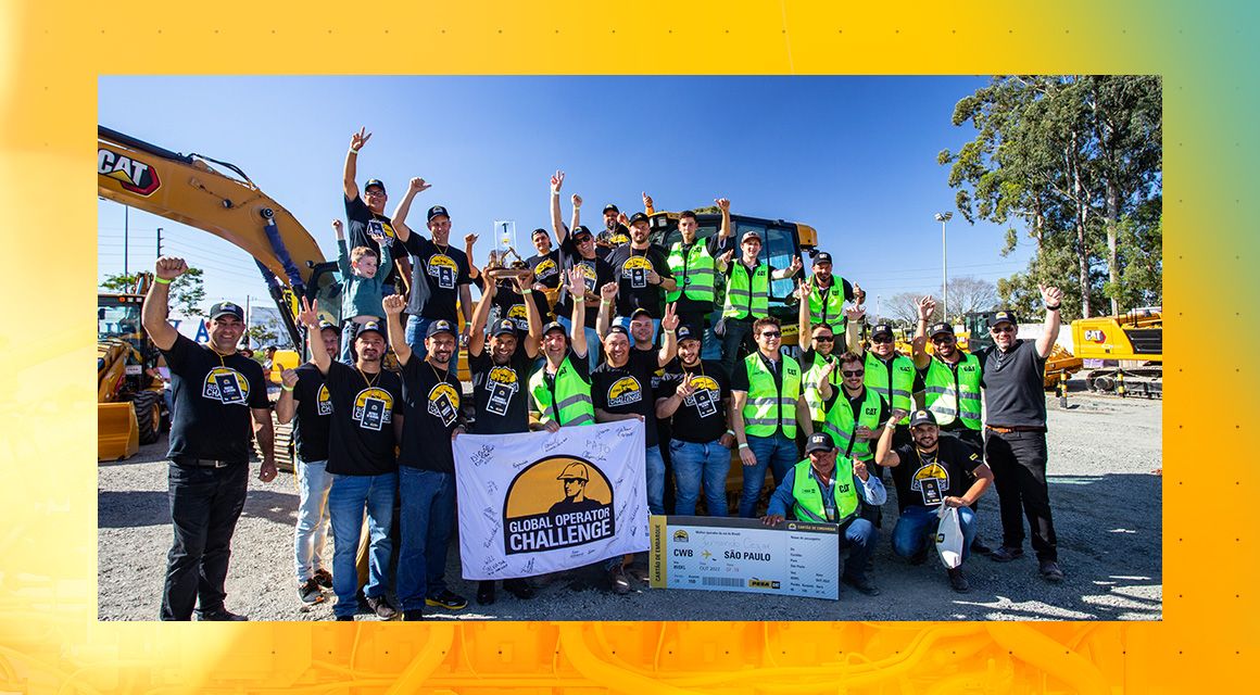 Team photo with a Global Operator Challenge banner