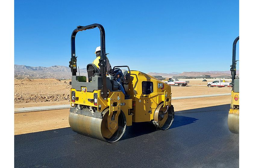 CB4.0 tandem roller compacting asphalt on a road