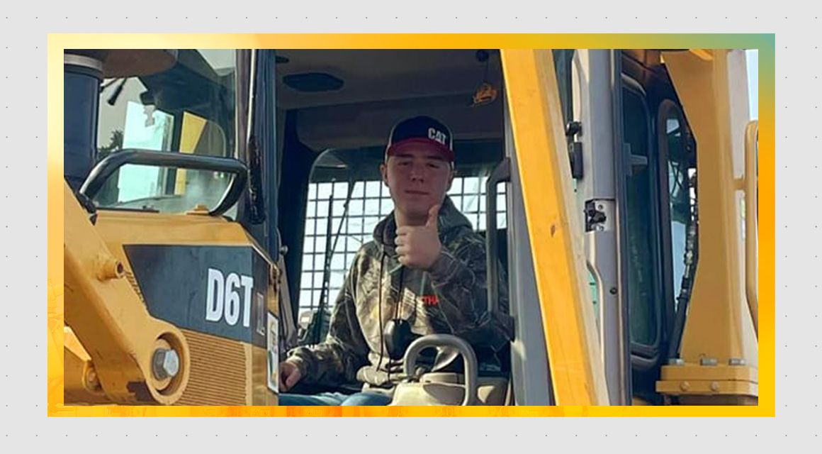 Ethan Lif in a Cat D6 wearing a Cat hat
