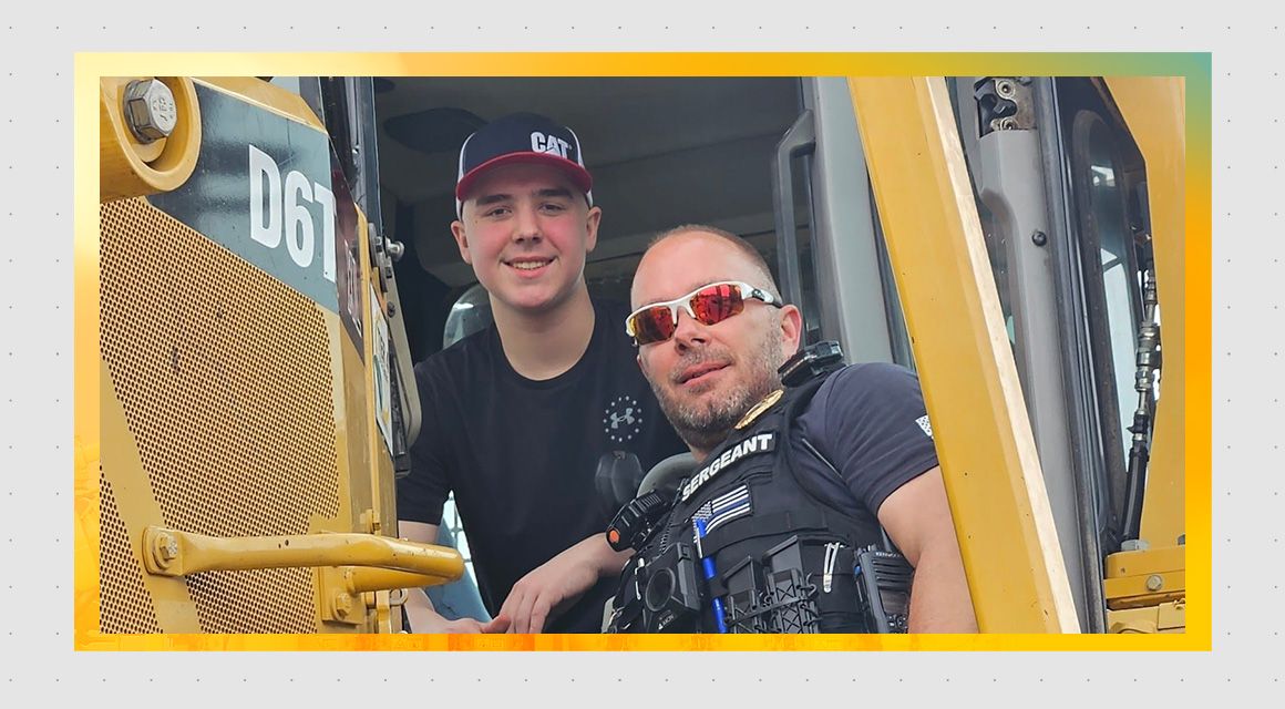 Ethan Lif in a Cat D6 wearing a Cat hat