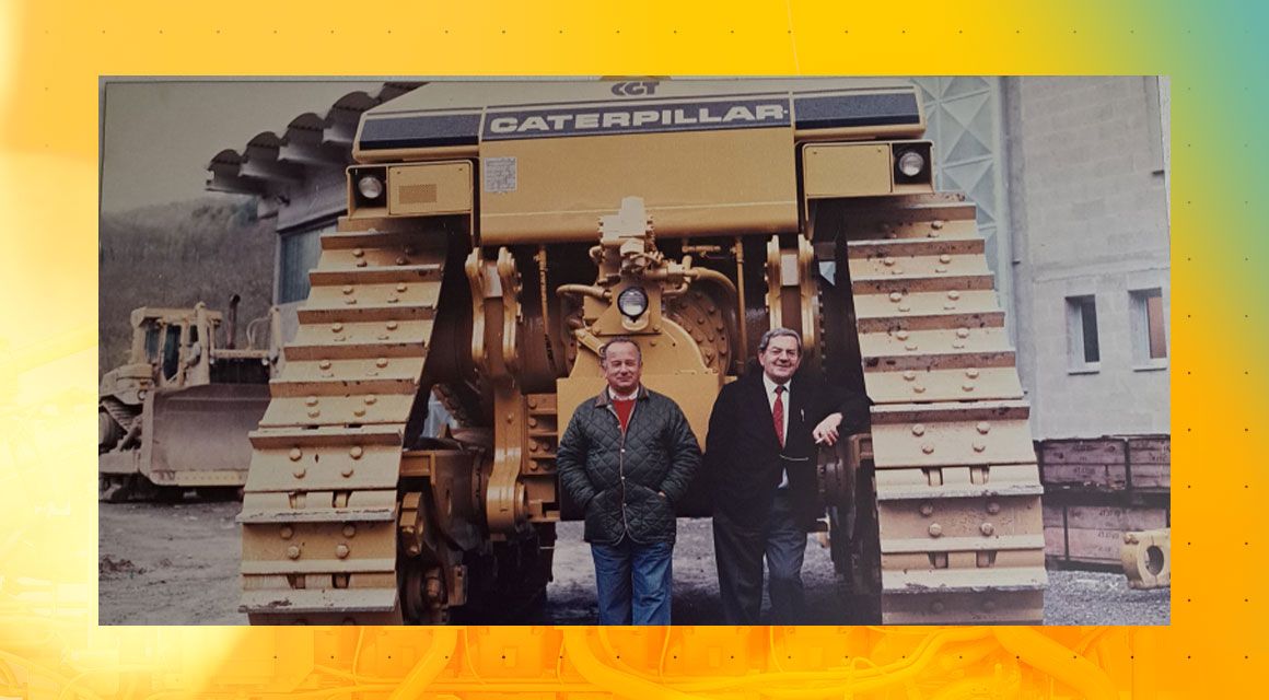 Founders of Cave Pedogna in front of Cat machine