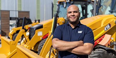 Cat dealer smiling at camera