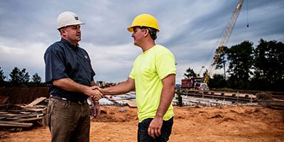handshake with Cat dealer