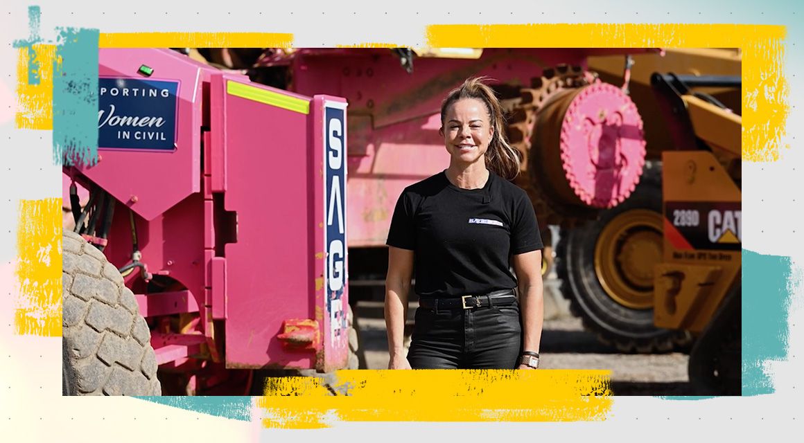 Asha Russell in front of a Cat machine