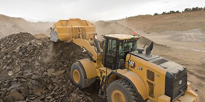 machine dumping rocks