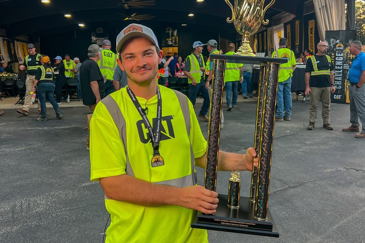 Brian Hayden, AmN Regional Winner, holding their trophy