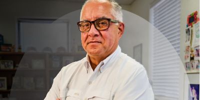 construction worker smiling in front of camera