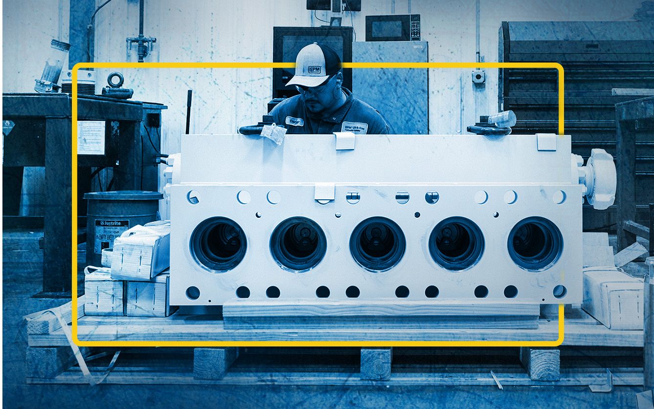 SPM Service Center Employee working on part