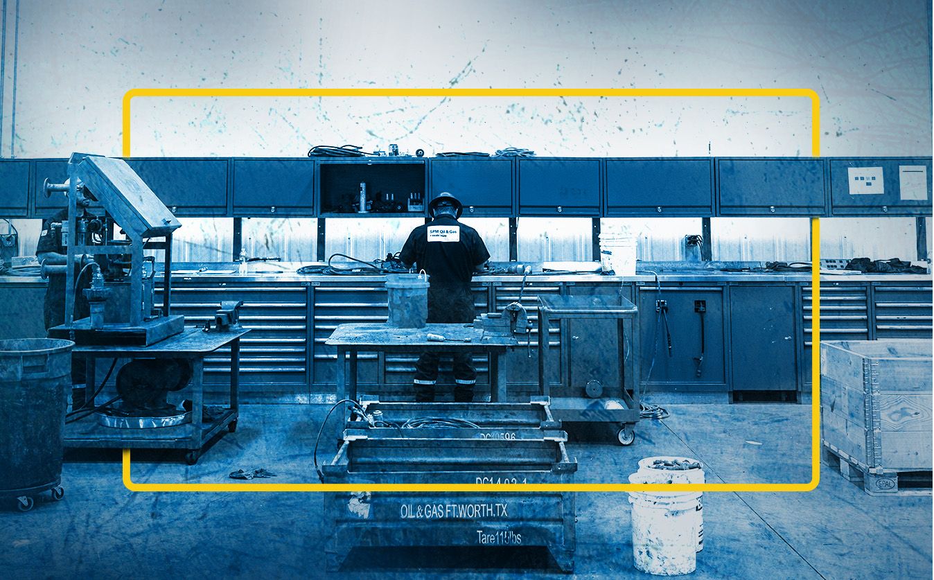 SPM service center employee at work station