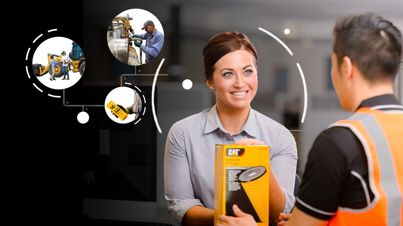 Cat dealer talking to customer