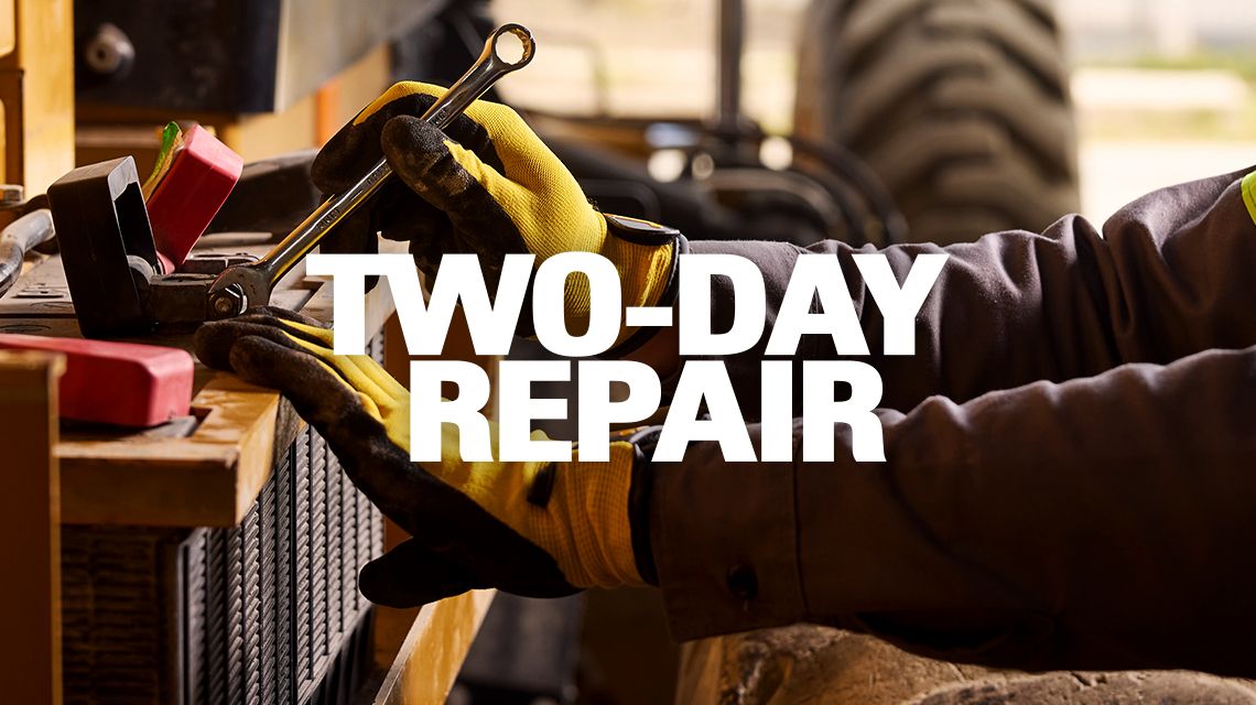 repair tech working on equipment with the title "Two-Day Repair"
