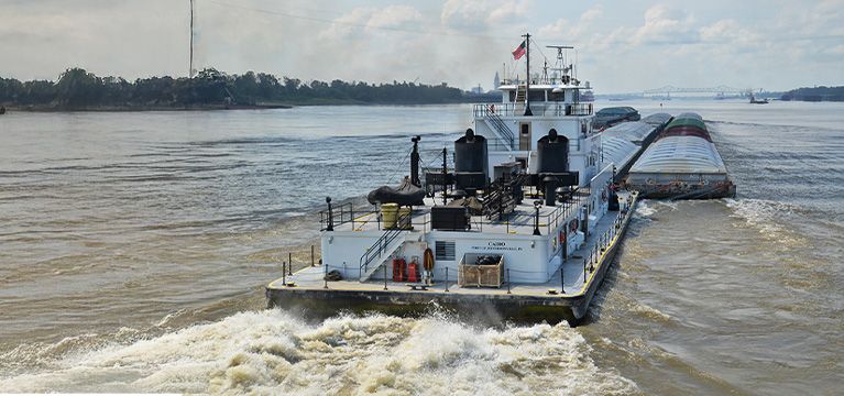 Cairo barge traveling on a river