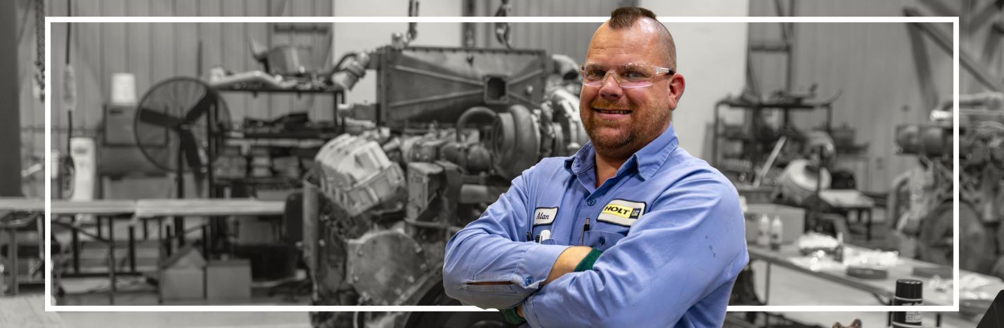 JW Holt employee smiling at camera